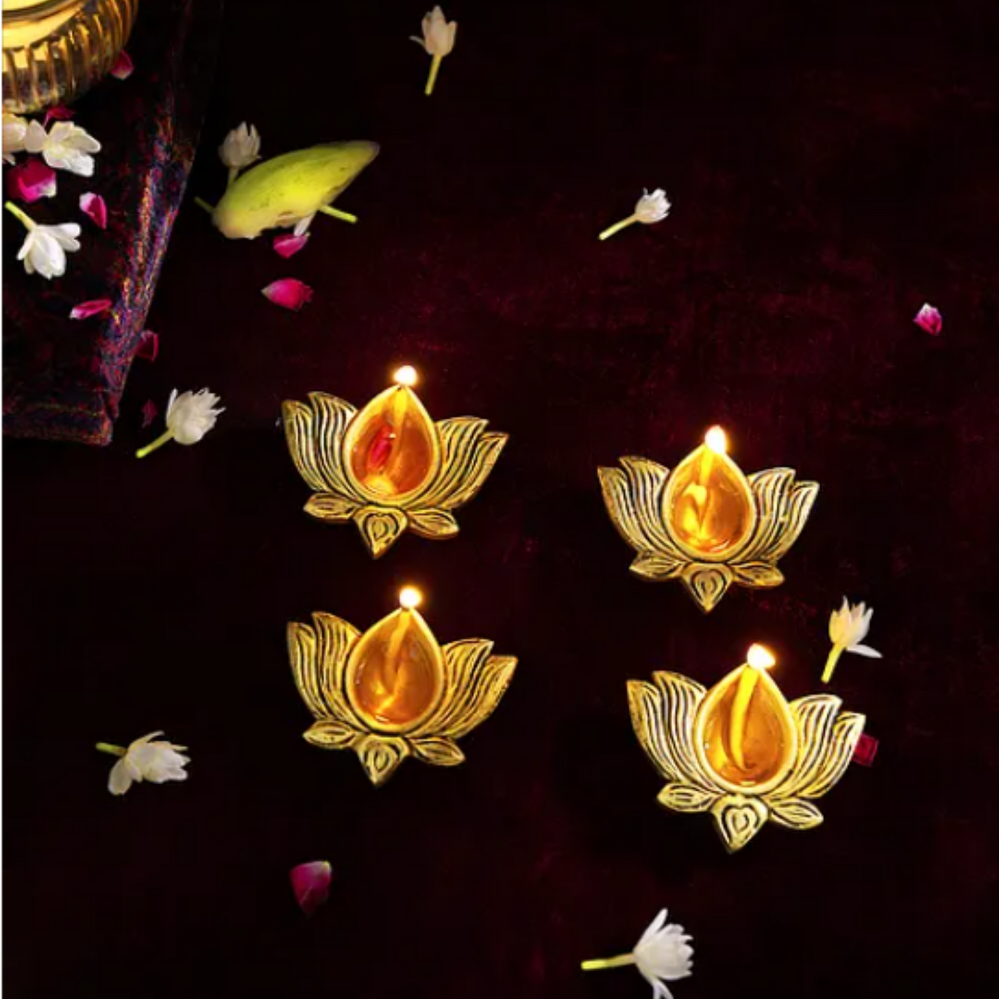 Brass Handcrafted Diyas (L- 2in, W- 2.5in, H- 0.5in) (Set Of 4)